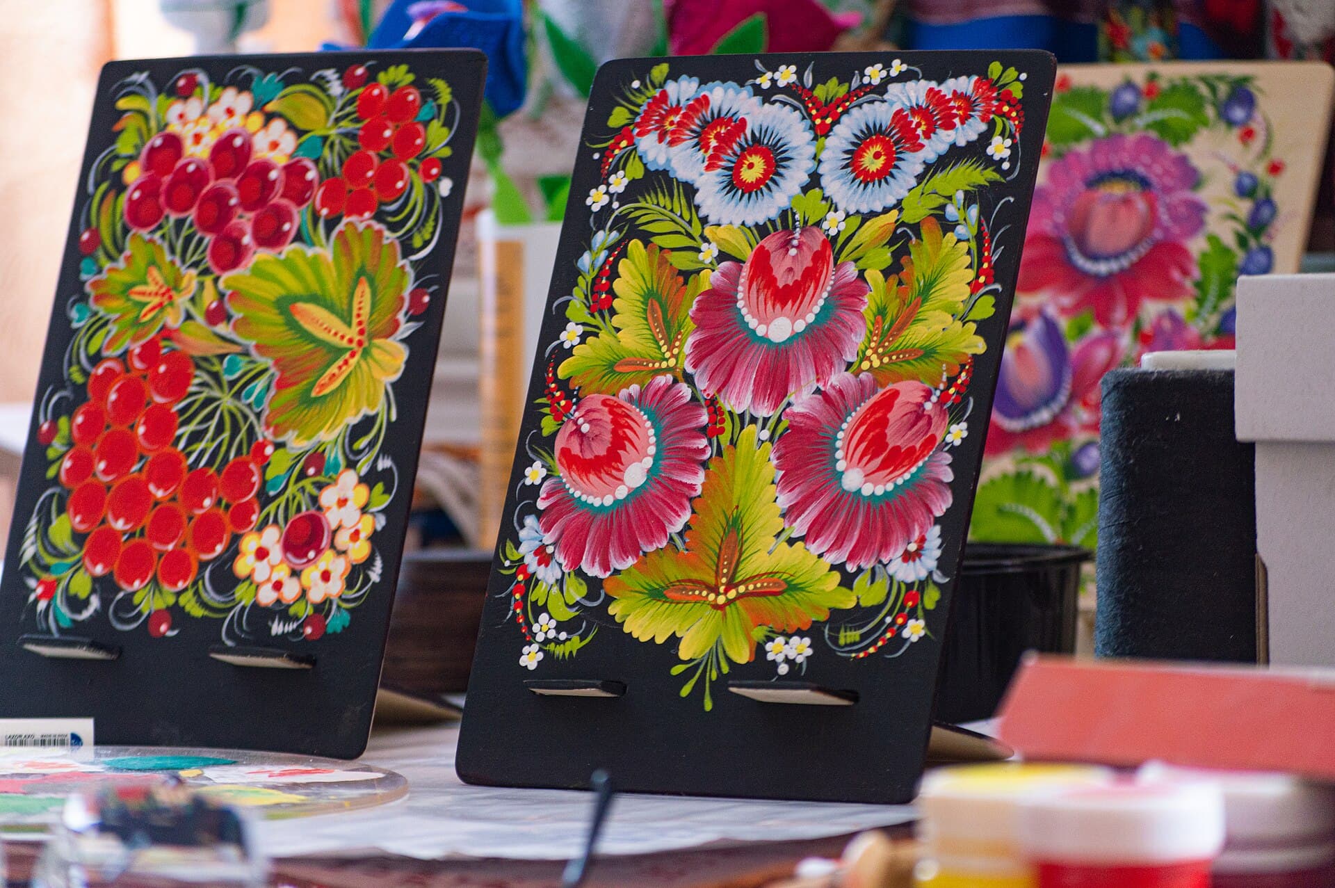 Painted boards on a market stall
