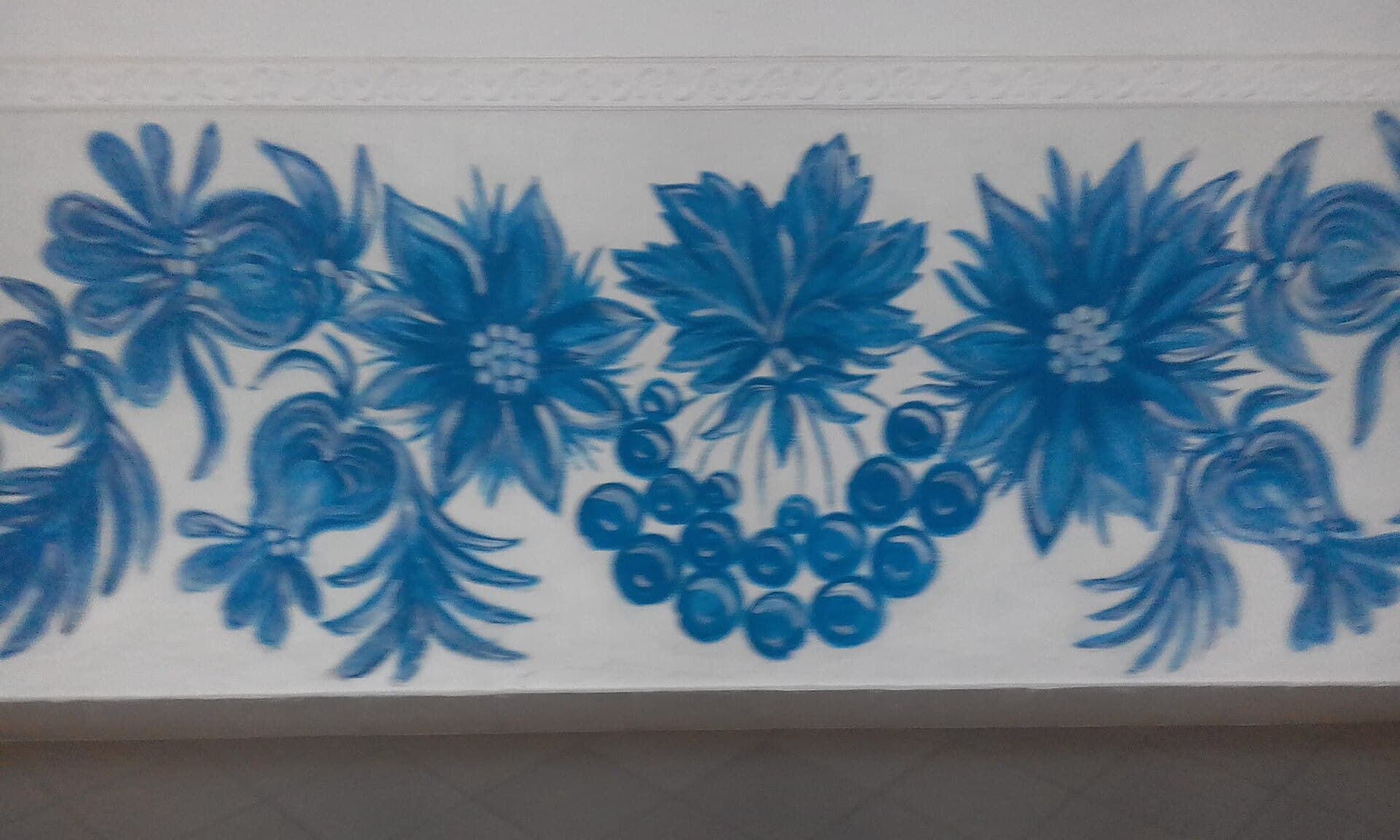 Blue frieze along a wall